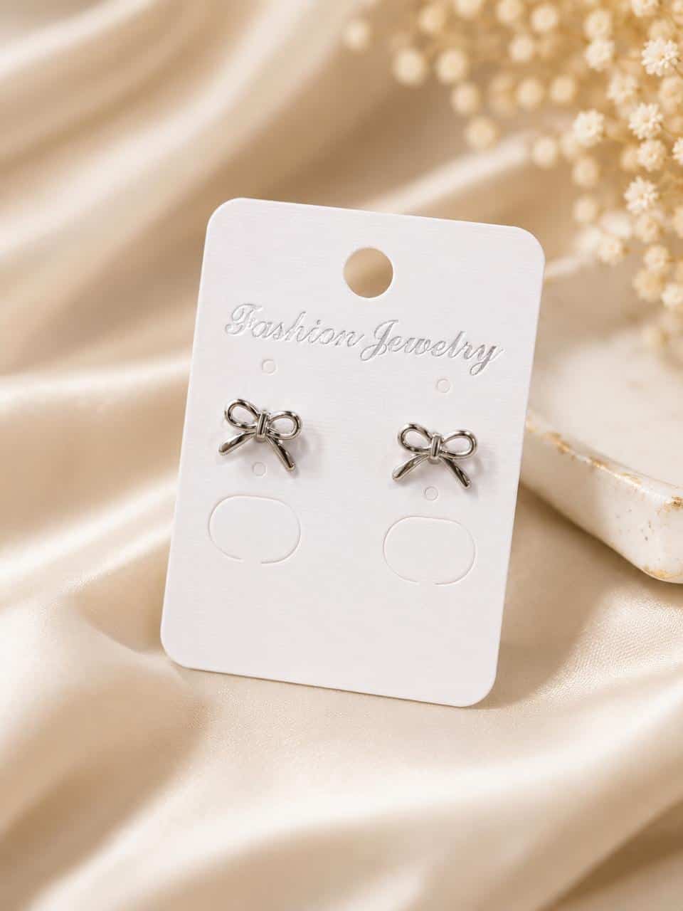 Silver Bow-Shaped Stud Earrings