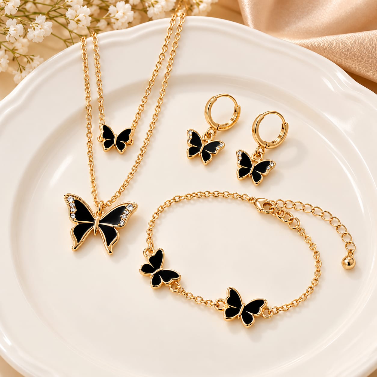 Women's butterfly-themed accessory set: double necklace, bracelet, and earrings